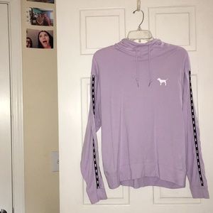 Long sleeve shirt with a hood.